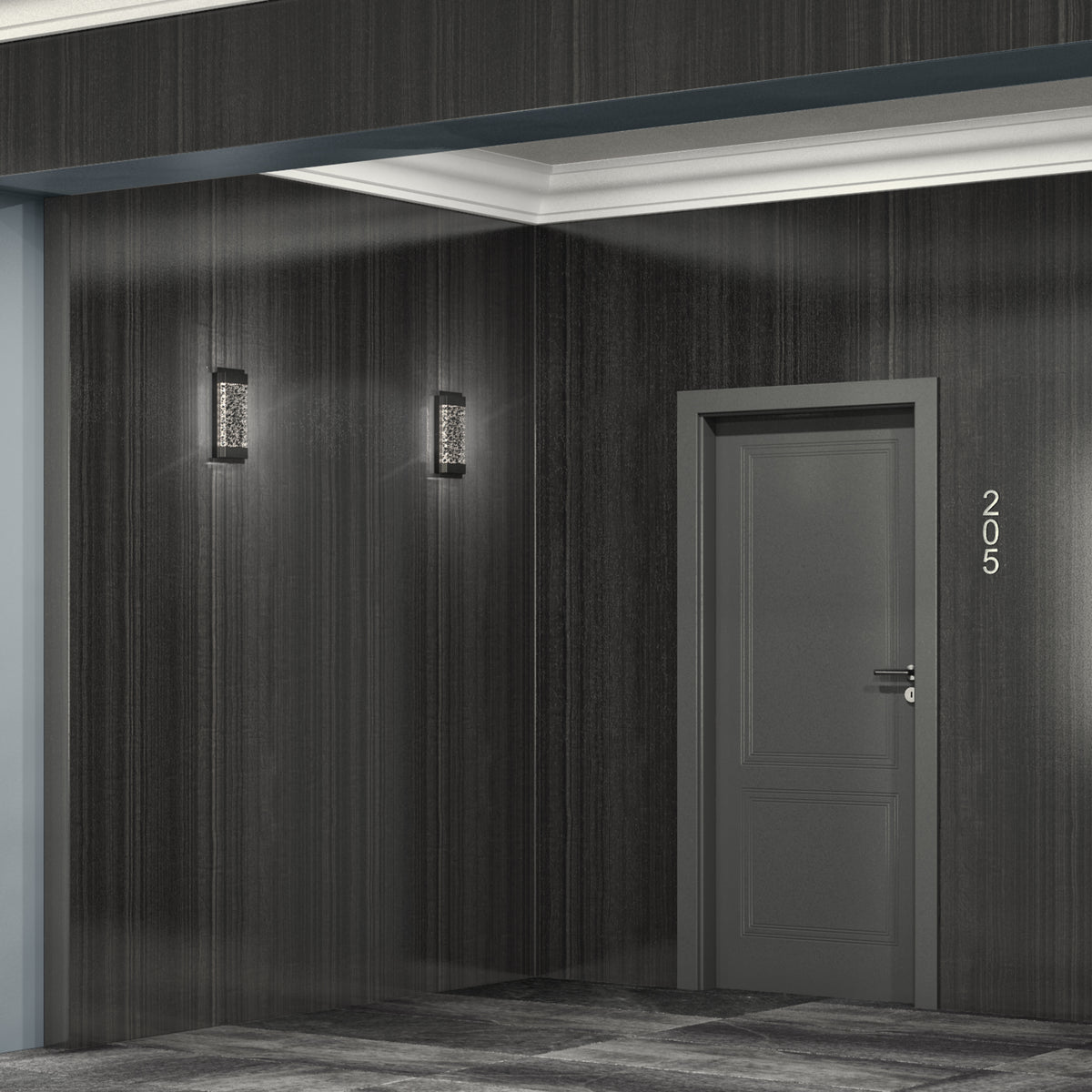 A modern hallway with dark wood-paneled walls features two Artika Essence Glow Box indoor-outdoor LED wall lights and a closed gray door labeled 205 with a lock. White crown molding accents the ceiling.