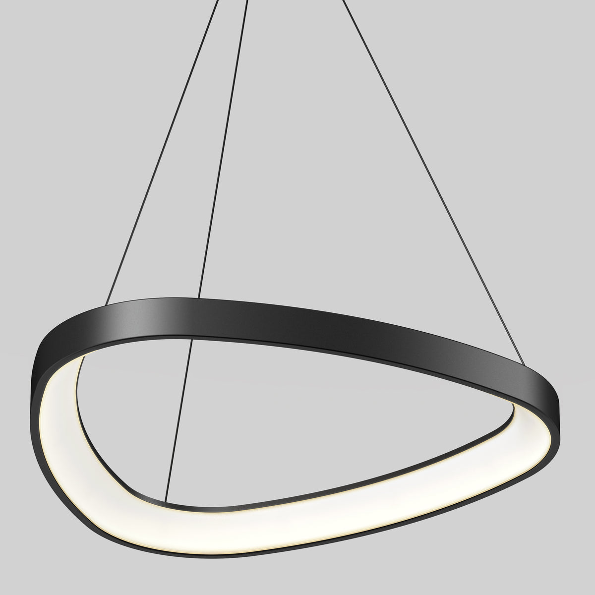 The Artika Bjorn modern LED pendant light 5 CCT features an asymmetrical black oval frame, suspended by three slim cables, set against a plain light gray background.