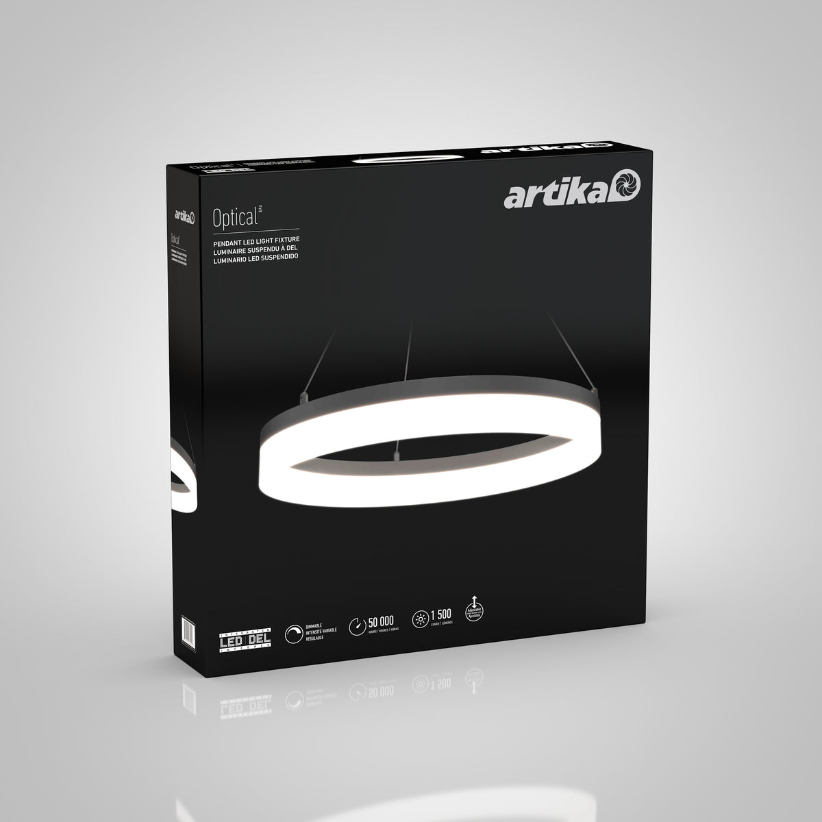 A black retail box displays the Artika Optical LED pendant light 3 CCT, showing its illuminated circular ring suspended by wires, with featured product details and Artika branding on the packaging.