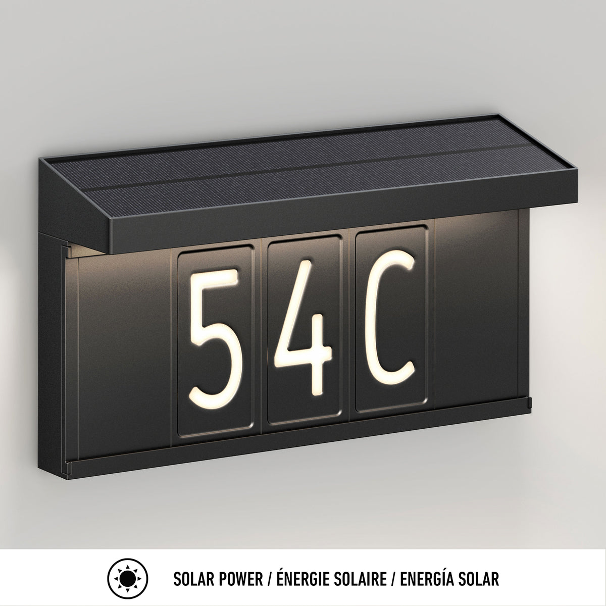 The Artika Bowen solar LED outdoor address wall light 5 CCT displays "54C" in illuminated white on a light gray background, with maintenance-free solar power details in English, French, and Spanish.