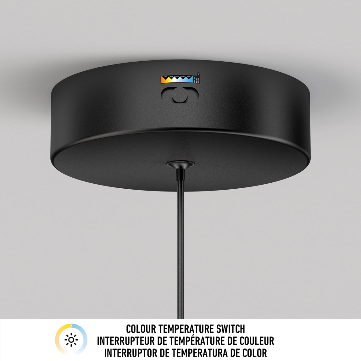 The Artika Corben Pendant LED light 5CCT Black features a central button with a color temperature indicator, a hanging cord, and a label below reading Colour Temperature Switch in English and French.