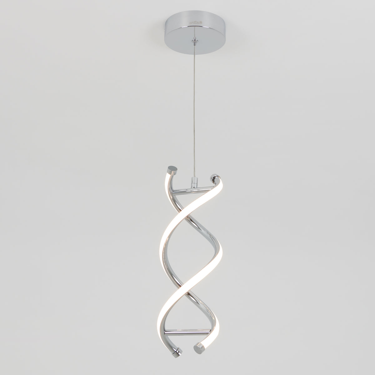 The Artika DNA LED pendant light features two intertwined, illuminated strips in a sculptural twisted design with a chrome finish and integrated LEDs, suspended from a round ceiling mount.