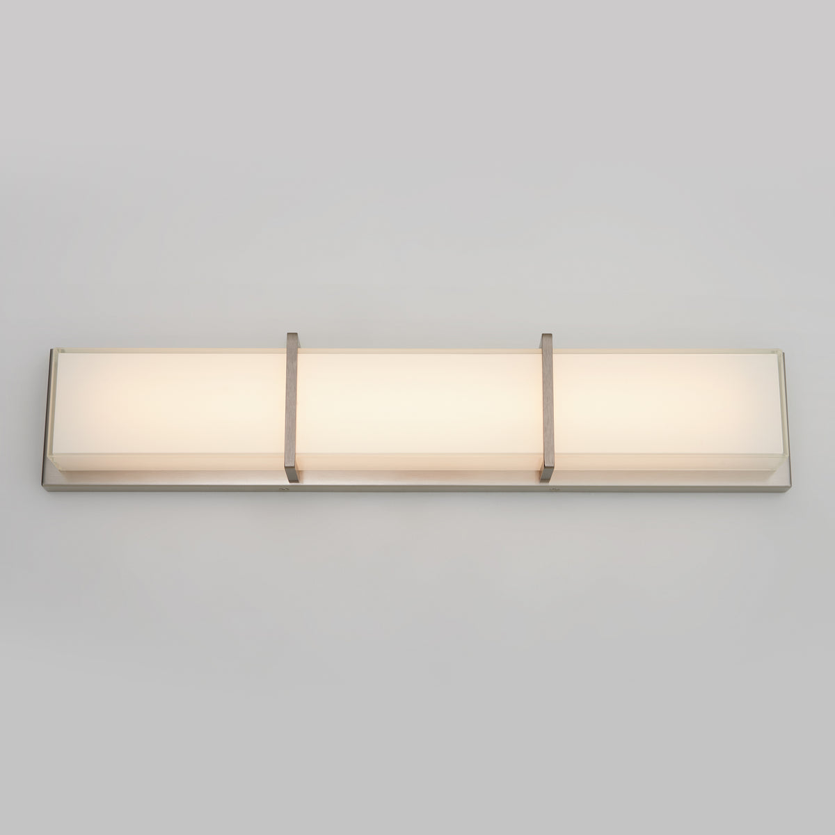 Artika Subway modern LED bathroom vanity light with frosted glass, three metal brackets, on a light gray background.