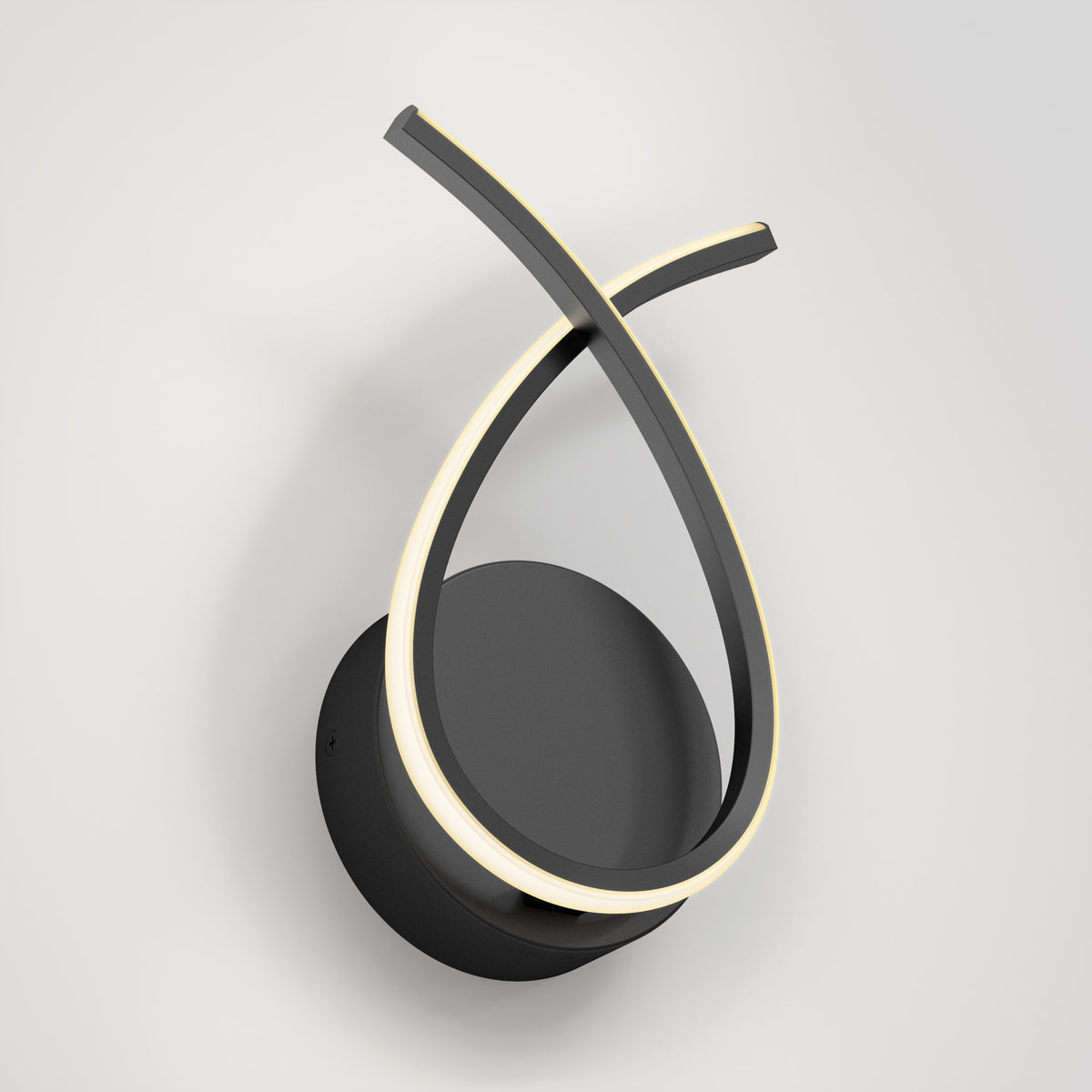 The Artika Gamma modern LED wall sconce 5 CCT features a circular black base and two intertwined curved light strips, offering a minimalist, sculptural design with adjustable warm illumination.