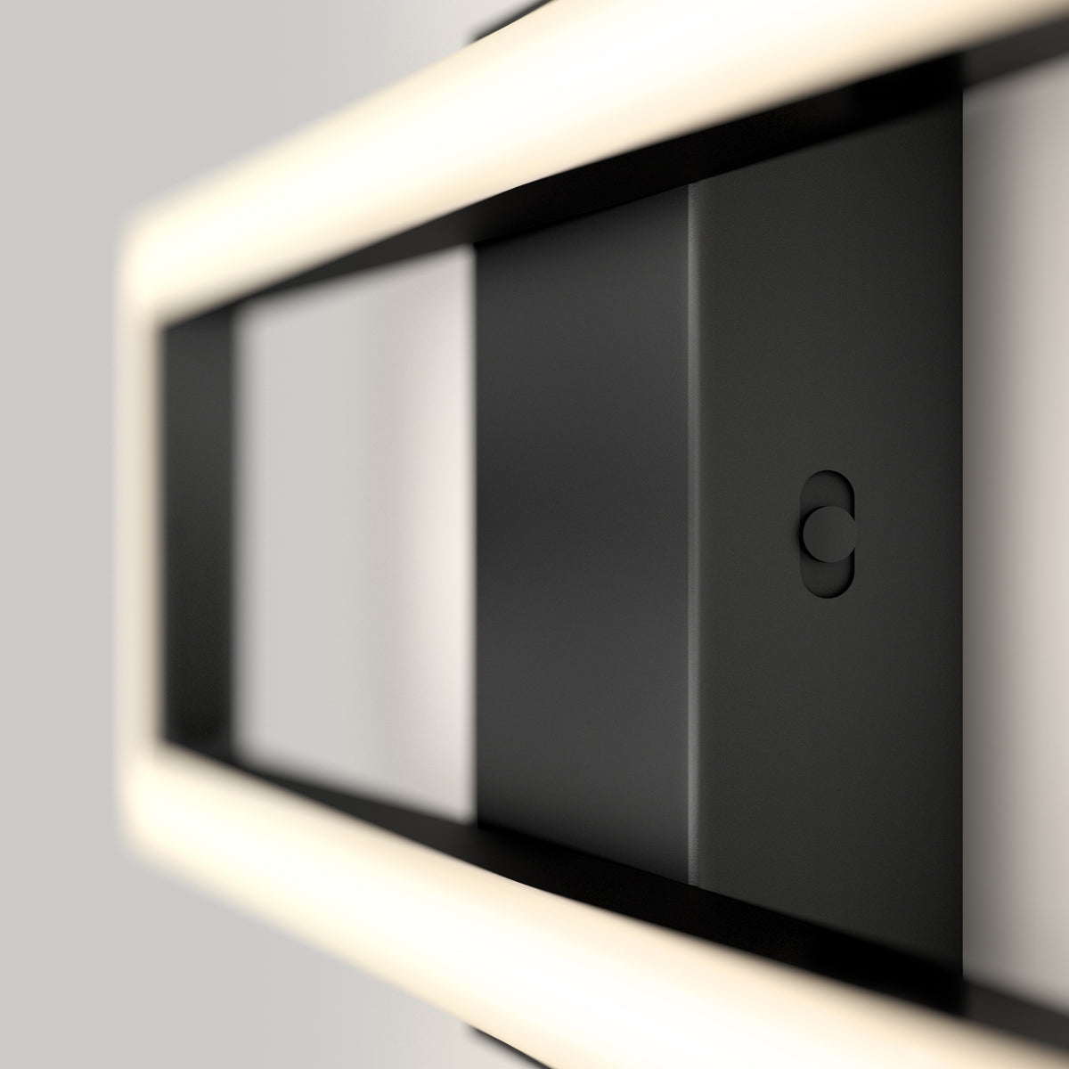 A close-up of the Artika Dover 27-in Integrated LED 5-CCT Vanity Light Bar shows its modern, minimal design with glowing rectangular edges, a matte finish, and a small circular button—perfect for any contemporary bathroom.