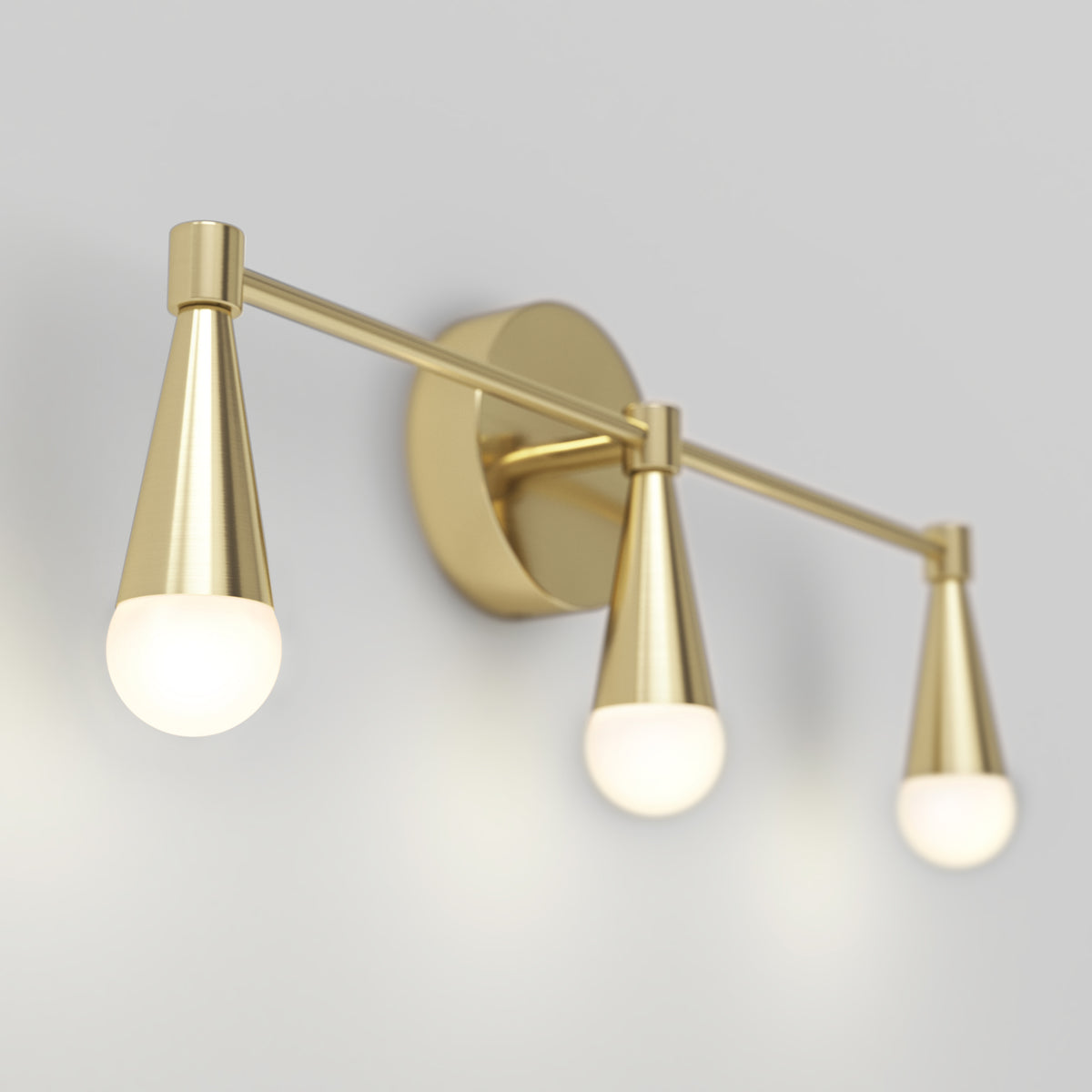The Artika Wayden LED mid-century vanity light features three gold cone arms with frosted bulbs on a circular base.