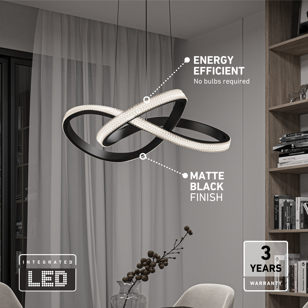 The Artika Morgan LED contemporary pendant light with intertwined matte black loops and 5 CCT settings hangs stylishly in a living room. Features energy efficiency, integrated LED, 3-year warranty; shelves, chair, and vase in background.