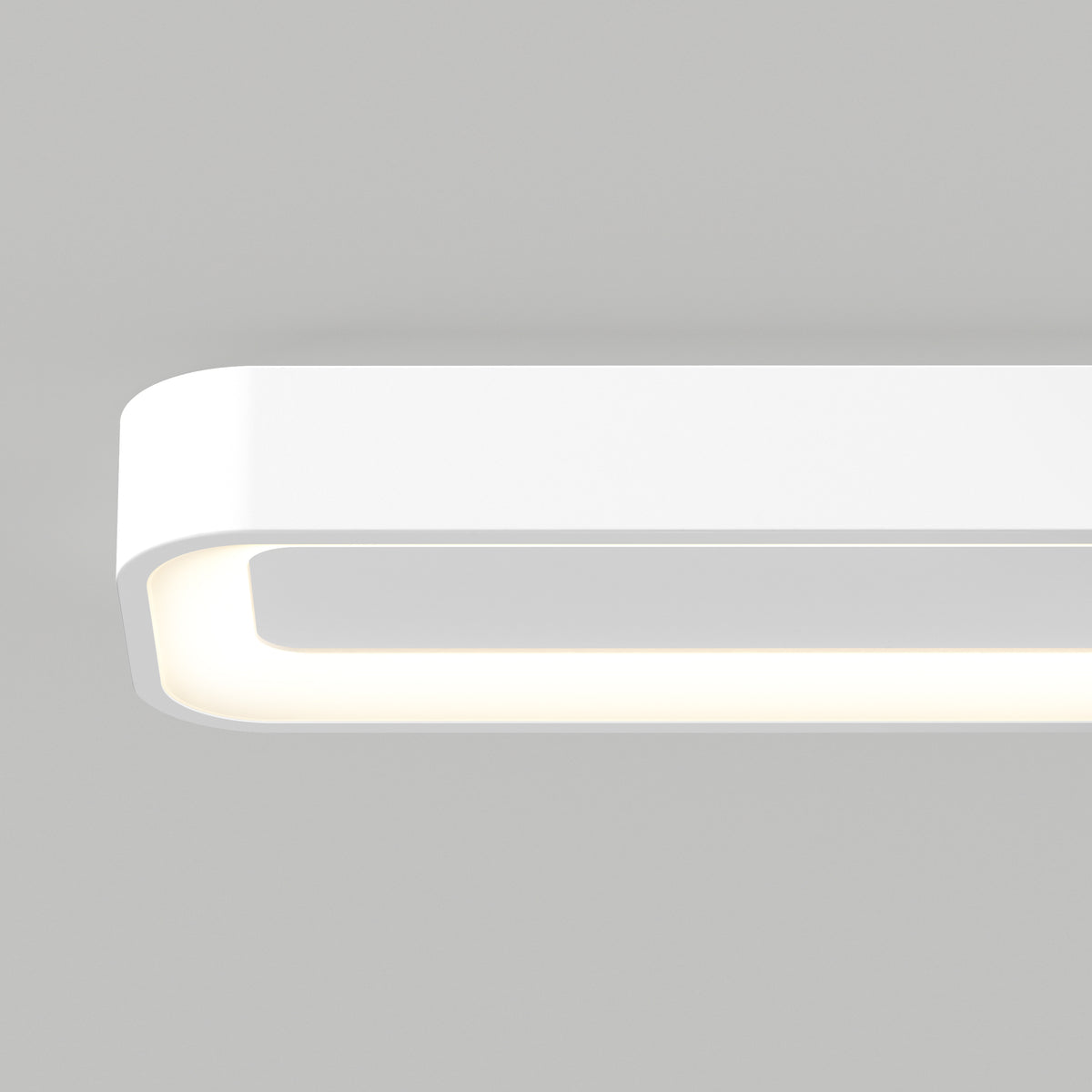 A close-up of the Artika Aiden 48 in. LED modern flush mount light 5 CCT, featuring rounded edges and a soft glow, set against a plain light gray background.