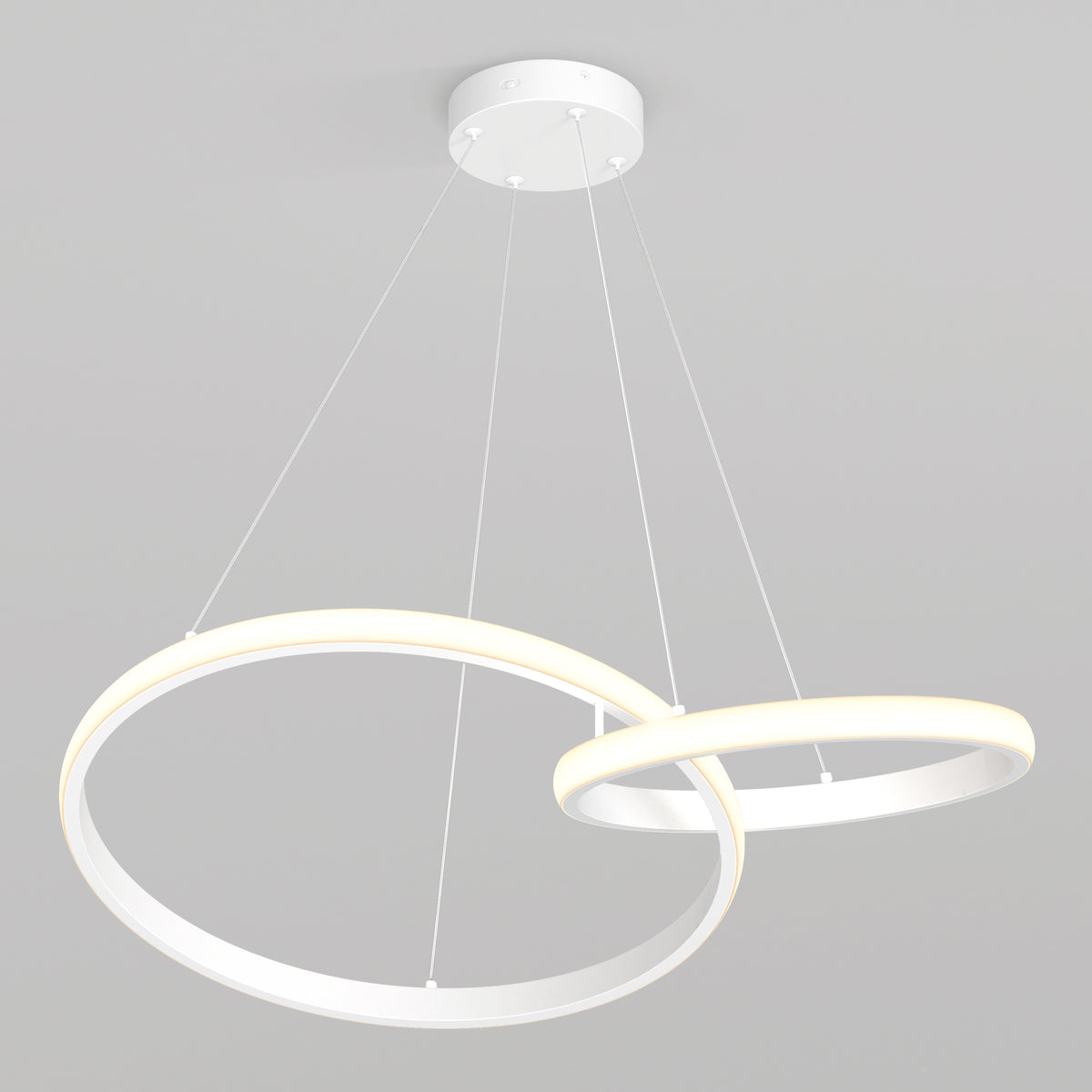 The Artika Mora 28" LED Pendant features two suspended, intersecting LED rings of varying sizes, hanging from a white base by thin wires against a plain gray background. This modern ceiling fixture offers 5 color temperature options.