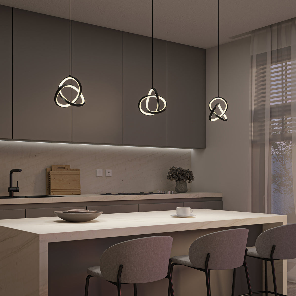 Modern kitchen with a marble island, three gray bar stools, minimalist cabinetry, and three Artika Zephyr LED pendants hanging above the island. Soft lighting and a large window with sheer curtains complete the space.