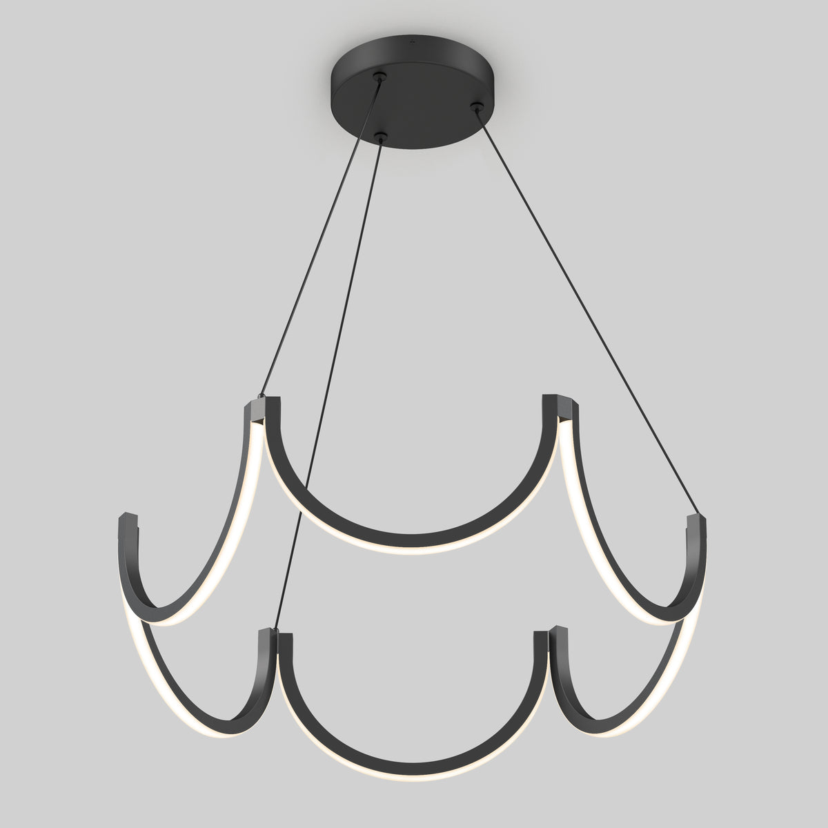 The Artika Adelia LED pendant light 5 CCT features two curved segmented LED rings suspended by three wires from a round black base, creating a modern ceiling fixture against a light gray background.