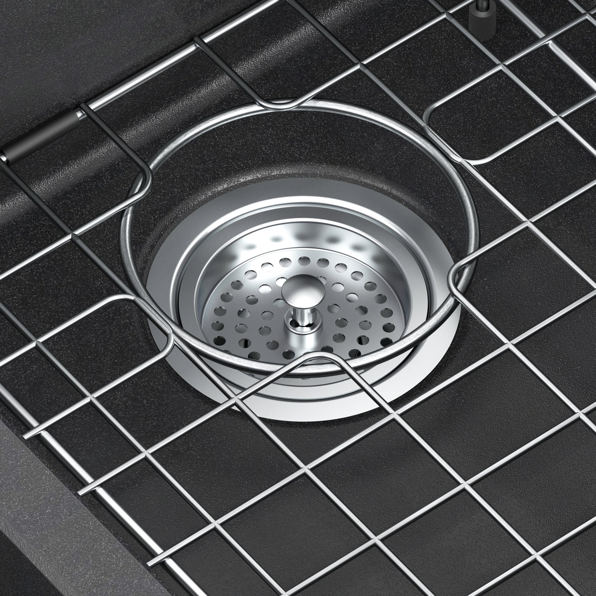 Close-up of the Artika Baycrest 33 in. Double Bowl Kitchen Sink in black, featuring a strainer and protective wire rack above the drain.
