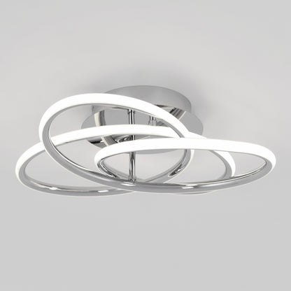 The Artika Swirl Butterfly LED contemporary flush mount light features three interlocking illuminated rings and a polished chrome base, displayed against a plain light gray background.