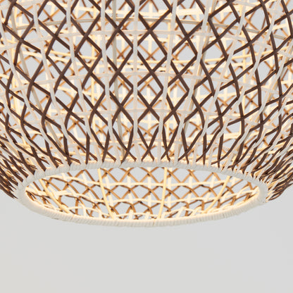 A close-up of the Artika Benson LED pendant light 5 CCT showcases its woven rattan geometric lattice shade, warmly illuminated from within, casting a glowing effect against a neutral background.