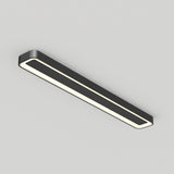 A modern rectangular ceiling light fixture with a black frame and a glowing white center, mounted on a plain light gray ceiling.