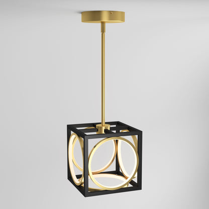 The Artika Astoria LED modern pendant light features a gold rod and ceiling mount, a black cubic frame, and glowing circular LED rings, showcased against a plain white background.