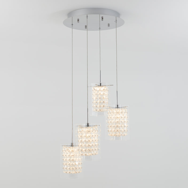 The Artika Crystal Cube 4-light LED pendant light features four textured, crystal-like cylindrical pendants at varying lengths, suspended from a round metallic base for a modern look.