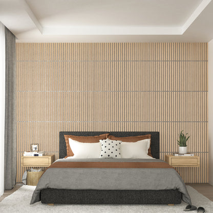 A modern bedroom featuring the Sonolok 15.5 ft sound-absorbing wall panel kit by Artika-CAN-dev as a textured accent wall, a dark upholstered bed, gray and brown bedding, wooden nightstands, a potted plant, and light-curtained windows.