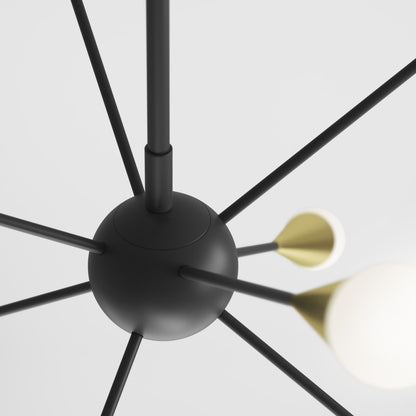 The Artika Wayden modern LED pendant light 3 CCT features a minimalist design with a central black sphere and thin black arms radiating outward, each tipped with gold and white bulb fixtures, set against a plain white background.
