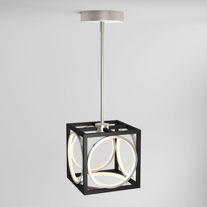 The Astoria LED modern pendant light by Artika showcases a black cube frame with intersecting circular LEDs, suspended from a sleek silver rod and mount, set against a plain white background.
