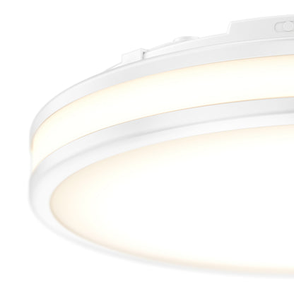 Close-up of the Artika Hemisphere 15 in. LED flush mount light, featuring a modern circular design and 5 selectable color temperatures, softly illuminating against a white background.