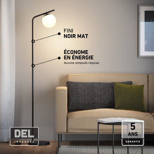 Artika Clayton dimmable LED modern mid-century floor lamp with a spherical glass shade, matte black finish, and integrated LED.