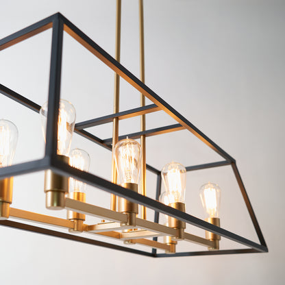 The Carter Long 8-light Chandelier by Artika features exposed bulbs and a black and gold metal frame, suspended from the ceiling against a plain light background.