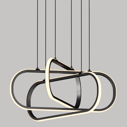 Artikas Lewis modern LED pendant light 3 CCT features three interlocking oval rings suspended by thin black cables, emitting a soft, even glow, perfect for contemporary spaces.