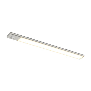 The Artika Outline under cabinet LED light 3CCT is a slim, rectangular silver fixture with a built-in switch on one end that emits a soft white glow.