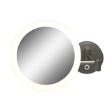 A round, wall-mounted mirror with a dark frame and an illuminated LED light ring around its edge, attached to an adjustable arm and base.