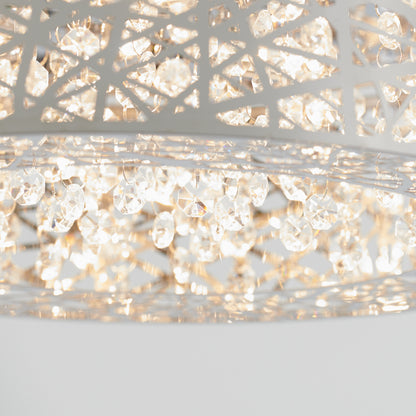 Close-up of the Artika Crystal Nest LED flush mount, featuring intricate metalwork and sparkling crystals illuminated by warm LEDs for a bright, elegant atmosphere.