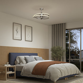 Modern bedroom with dark bed, wood accents, large window, plant, and Artika Coda 23 in. LED ceiling fan with remote.