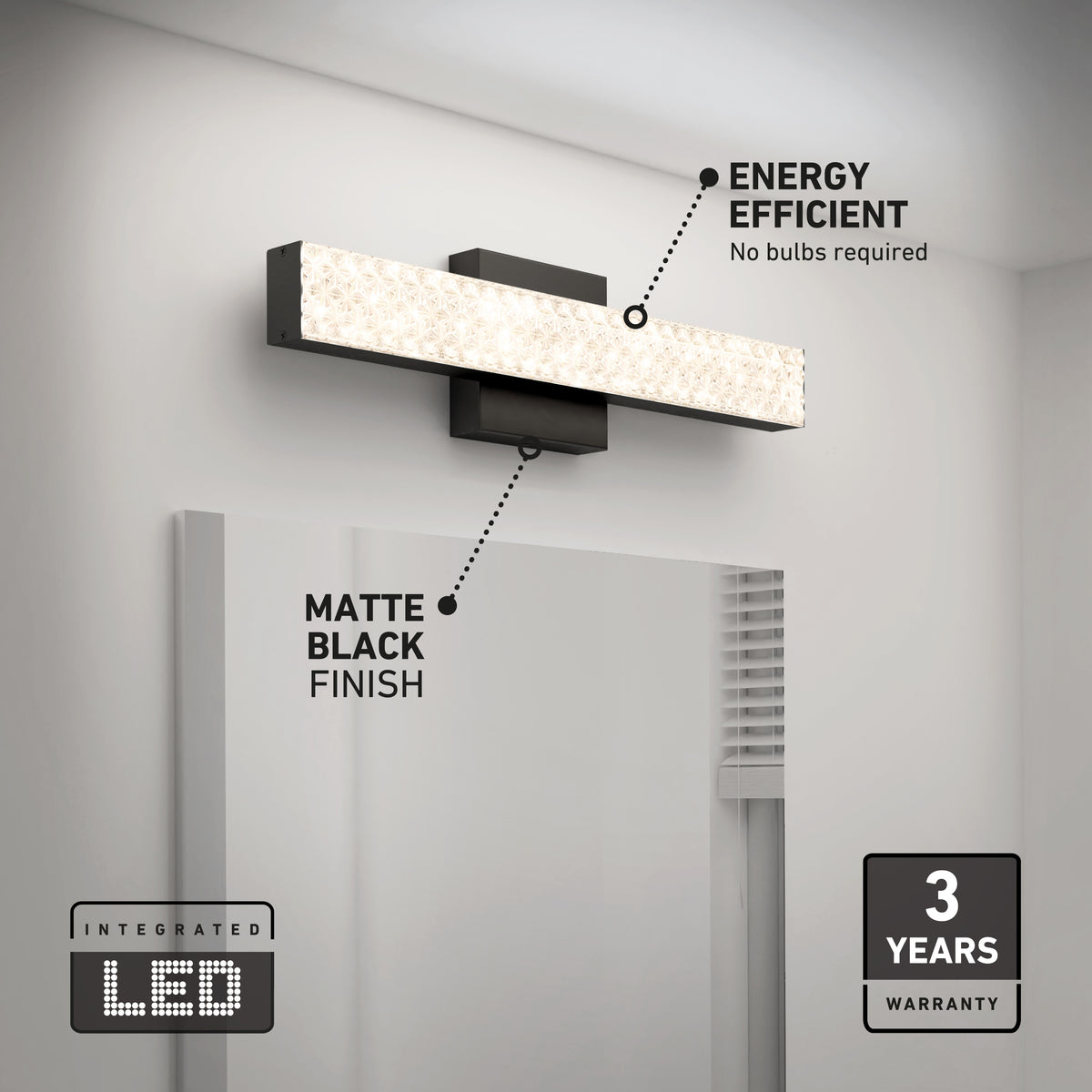 Rectangular LED vanity light with a matte black finish is mounted above a bathroom mirror. Text highlights its energy efficiency, matte black finish, integrated LED, and 3-year warranty.