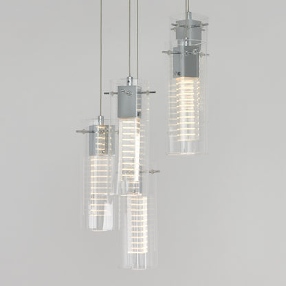 The Artika Hologram 5-light LED pendant features cylindrical glass shades with metallic accents and spiral LED bulbs, suspended at varying heights against a plain light gray background.