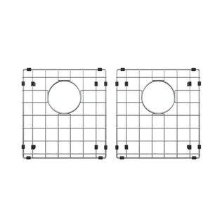 Two square metal sink grids for the Artika Newport twin bowl 33 in. stainless steel workstation sink are shown side by side on a white background, each with a grid pattern, central round hole, and black rubber feet at the corners and sides.