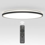 A modern, circular ceiling light with a black trim is shown above a remote control, which has multiple buttons and a wireless signal icon indicating remote operation. The background is plain white.