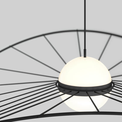 The Artika Tolena LED pendant light 3 CCT features a glowing white spherical shade suspended from the ceiling, encircled by a black metal frame with radial spokes, set against a light gray background.