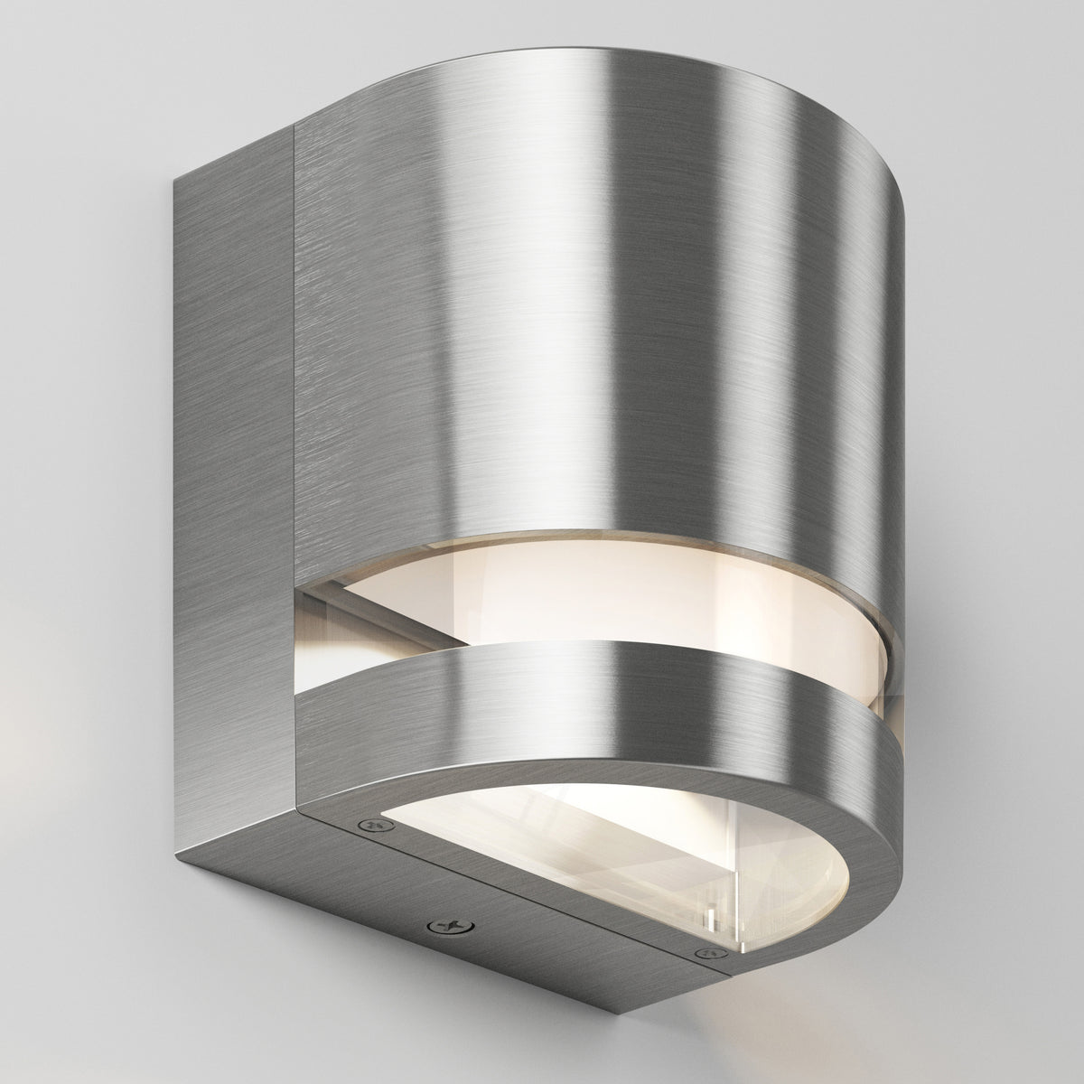 Artika Valor Round LED wall light with curved brushed metal and frosted glass, shown on a light gray wall.