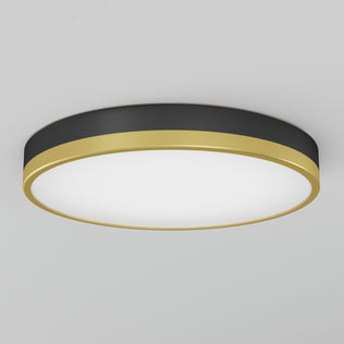 The Artika Kent LED flush mount light features a modern circular design with a black body, gold trim, and a smooth diffused white panel, shown centered against a plain light gray background.