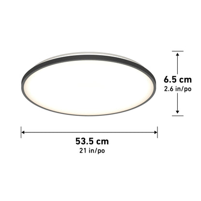 The Artika Europa 21 in. LED modern flush mount light features a round design with a diameter of 53.5 cm (21 in) and a height of 6.5 cm (2.6 in). Measurements are shown with arrows and labels in centimeters and inches. Includes remote control.