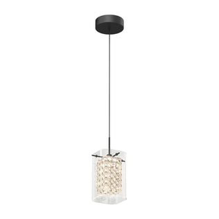 The Artika Crystal Cube 1-light LED pendant features a black ceiling mount, a slim black cord, and a cylindrical shade with clear crystal-like elements inside a transparent casing for a modern look.