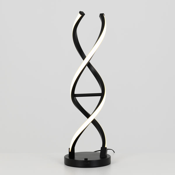 The Artika Swirl LED table lamp features two intertwined, spiral-shaped dimmable LED strips resembling a DNA double helix, set on a black and chrome base against a plain gray background.