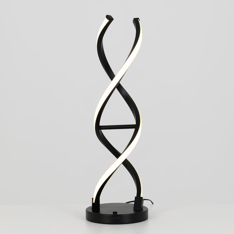 The Artika Swirl LED table lamp features two intertwined, spiral-shaped dimmable LED strips resembling a DNA double helix, set on a black and chrome base against a plain gray background.