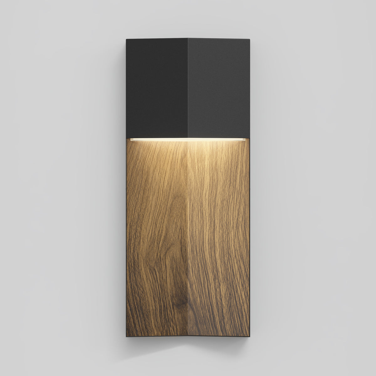 The Artika Howel modern LED indoor-outdoor wall light 5 CCT features a black top, natural wood grain lower section, and emits warm downward light. Shown on a plain, light gray wall.