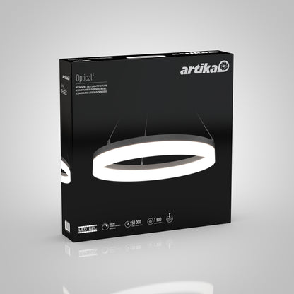 A black retail box displays the Artika Optical LED pendant light 3 CCT, showing its illuminated circular ring suspended by wires, with featured product details and Artika branding on the packaging.