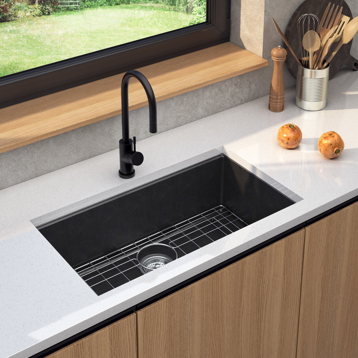 Artika Baycrest 31 in. Modern Sink with black faucet, onions on white countertop, and utensils by the window.