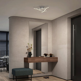 Modern hallway with floating console, mirror, vase, ottoman, and Artika Orly LED flush mount light with 3 CCT.