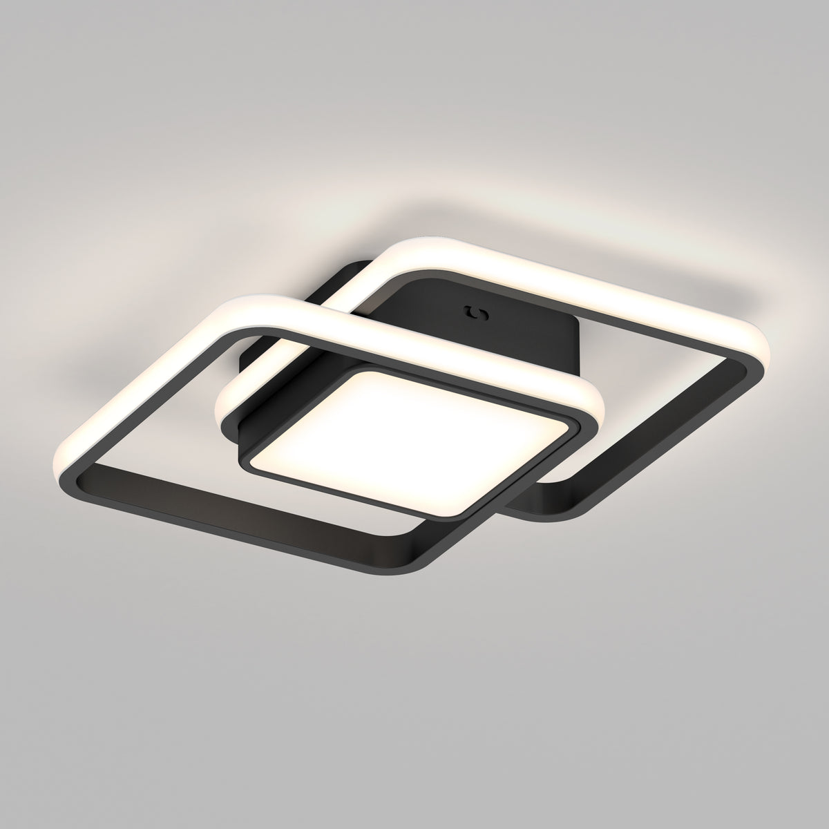 A modern ceiling light fixture with two overlapping, illuminated square frames and a central square light, mounted on a white ceiling. The design is sleek and minimalist in black and white tones.