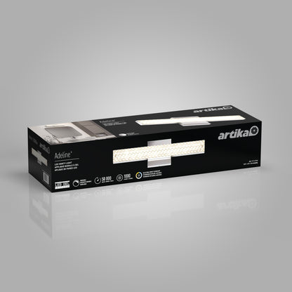 A rectangular black Artika box showcases the Adeline modern LED bathroom vanity light 3 CCT, featuring product images, details, and specifications on the packaging.