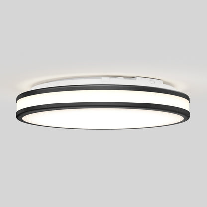 The Artika Hemisphere 15 in. LED flush mount light 5 CCT features a modern round design, adjustable brightness, a white center panel, black outer ring, and is shown mounted on a light gray ceiling.